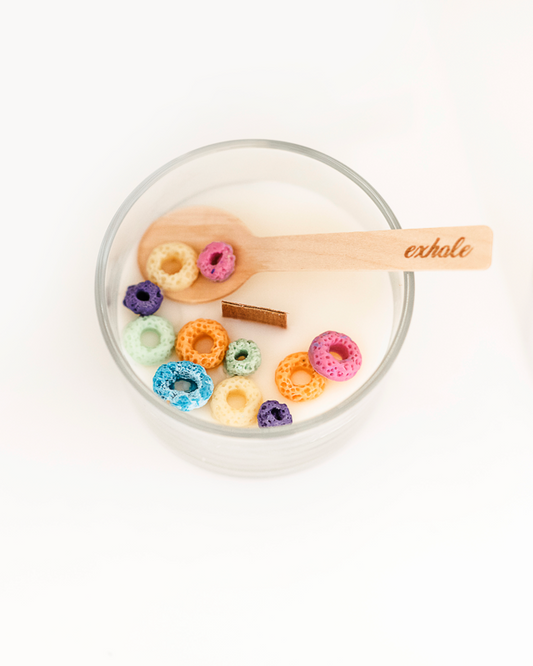 wood wick candle with bamboo spoon and wax carved fruit loops cereal