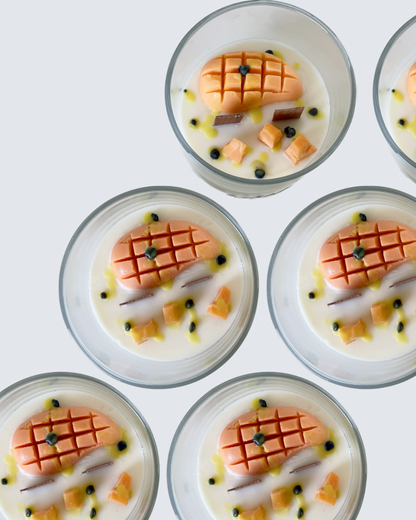 pavlova candles being made with soy wax carved toppings of porcupine mango and passionfruit seeds